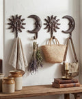 Solid As A Rock Vintage Cast Iron Sun Moon Wall Hooks Heavy Duty Decorative Hanging Hangers For Coats Scarves Bags Towels Keys Real Deal Storage Upgrade With Hardware Included For Everyday Use on wall with towels and bags.
