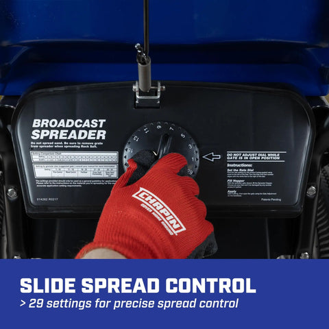Hand adjusting 29 settings on All Season Workhorse Salt And Ice Melt Spreader, 80 lb capacity, walk behind broadcast spreader control panel.