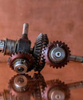 Close-up of Bevel Gear Duo Pack 0.8 Module 1to1 Reduction 15 Teeth With 5mm Bore 45 Steel, showing gears and shafts