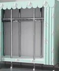 Roomy Portable Canvas Wardrobe Big Time Clothes Closet With Sturdy Hanging Rail And Plentiful Shelves For No Sweat Bedroom Organization Plus Zippered Heavy Duty Fabric Cover in green with chrome frame.