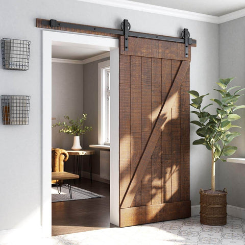 Beefed Up Heavy Duty Sliding Barn Door Hardware Kit Black Steel Track System With Industrial Bigwheel Hangers installed in room