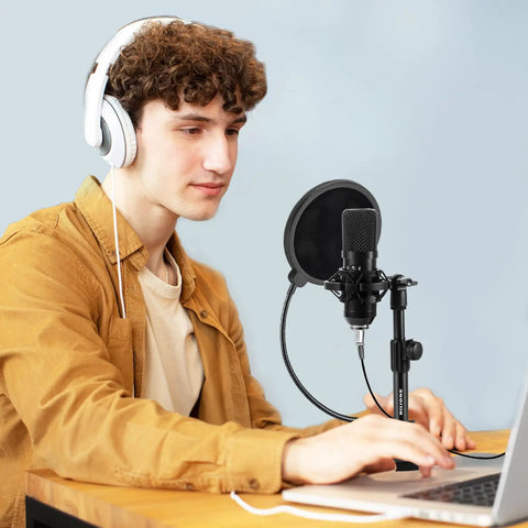 Person using Multifunctional Desktop Microphone Stand For Live Streaming And Studio Recording With Pop Filter Shock Mount Microphone Clip