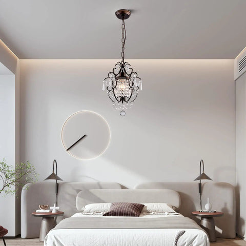 Modern Mini Crystal Chandelier With Iron Bronze Finish Ceiling Mount 1 Light Lighting Fixture illuminating a chic bedroom.
