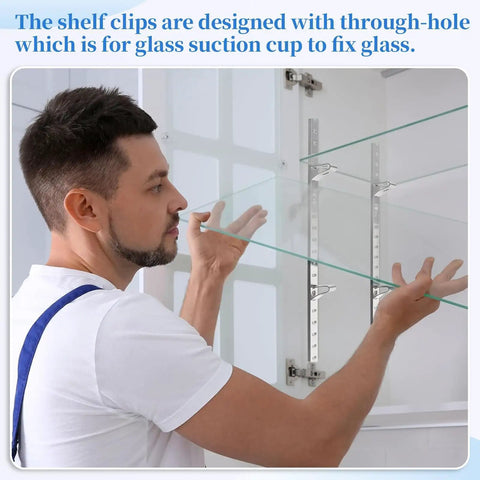 Person installing 8 Pcs 40 Inch Shelf Pilaster Tracks with Adjustable Metal Shelf Clips on a glass shelf in a cabinet.
