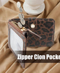 Streamlined Rfid Blocking Keychain Wallet With Genuine Leather Wrist Strap showing a zipper coin pocket and card holder.