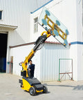 Heavy Duty Industrial Glass Vacuum Lifter Equipped With Mobile Hydraulic Suction Cups For No Sweat Granite Marble And Thick Panel Glass Placement Keeping Site Work Rolling lifting a large glass panel with suction cups.