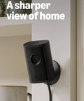 Wireless Indoor Security Camera With Retinal 2K Video And 6X Optical Zoom For Crisp True Color Footage Day Or Night Straight Up Solid Home Safety Monitor Black mounted on wall.