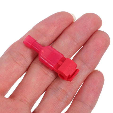 Quick Connect Spade Terminal Kit With 60 Pairs Fast Splice Wire Connectors For Soft Electrical Cables And Home Speaker Wiring Without Stripping Or Cutting Old Wires On Complex Setups Today. red insulated splice connector in hand