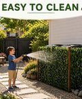 Kid spraying water on Expandable Wooden Privacy Fence Panel With Dope Artificial Flowers And Greenery for Outdoor Privacy Screen