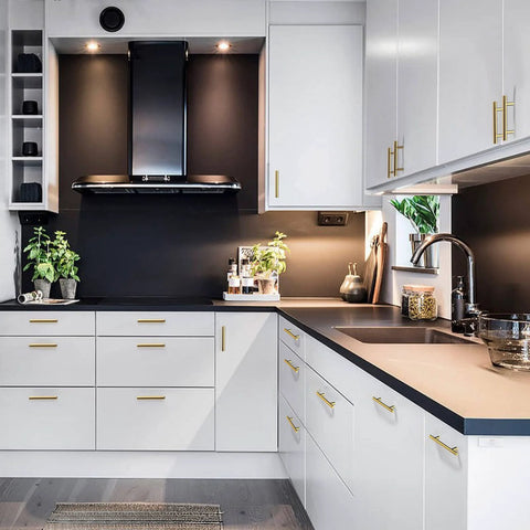 Modern kitchen featuring 30 Pack Gold Cabinet Handles With 3 Inch Hole Centers Brushed Brass Finish Stainless Steel Dresser Drawer Pulls.