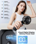 Rechargeable Portable Handheld Fan With 4000mAh Battery, 180 Degree Adjustable Head, 6 Speed Wind To Beat The Heat, Real Time Battery Display, USB Rechargeable Foldable Quiet Personal Fan That Doubles As A Power Bank For Travel And On The Go Outdoors in use, showing visual digital battery display and speed settings.