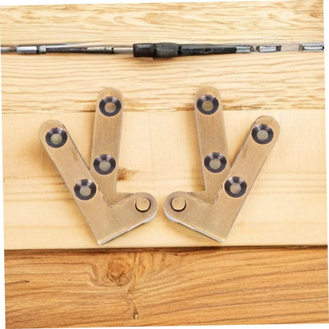 Hidden Door Hinge Set For Secret Bookcases And Concealed Doors, on wooden surface, showing heavy-duty pivot hinge with bronze finish