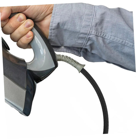 Person holding iron connected to Pro Grade Heavy Duty Steam Hose For Steam Iron Replacement High Temperature Hose For Professional Steam Irons And Heat Resistant Steam Tube Easy Install No Tools Needed