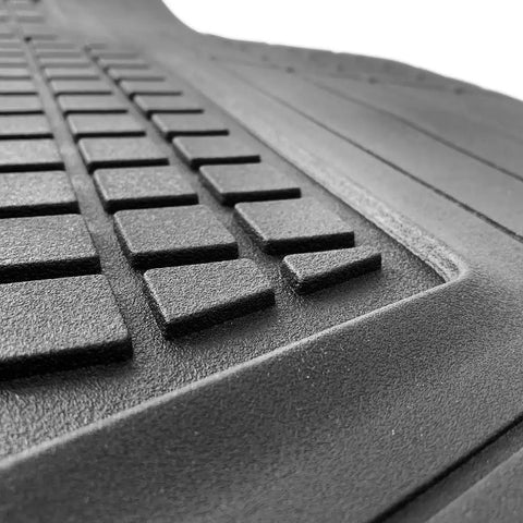 Close-up of built tough heavy duty trimmable cargo mat liner with deep traction grips in classic black, showing texture.