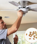 Man securing a ceiling fan using Rock Solid Copper Finished Ceiling Fan Blade Screws 20 Piece Set Of Heavy Duty Carbon Steel Phillips Bolts.