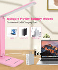 Pink LED desk lamp and USB charger beside a laptop, showcasing multiple power supply modes and charging options.