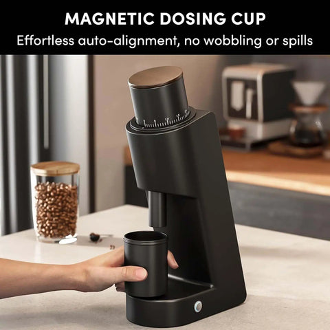 Top Shelf Electric Conical Burr Coffee Grinder Single Dose Fresh Roast Mill With Quick Stepless Dialing For Espresso Pour Over Drip And French Press In Clean White with magnetic dosing cup in use.