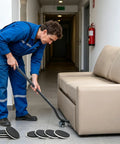 Man using ergonomic lifter tool with Super Easy Heavy Furniture Sliding Kit With Eight Premium Moving Pads And Ergonomic Lifter Tool For Sofa Fridge Machine Repositioning Without Strain.