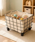 Heavy Duty Rolling Storage Basket For Toys, Smooth Swivel Caster Wheels Organizer With Removable Canvas Liner, filled with colorful toys.