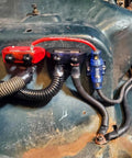 Ridiculously Strong 3/8 Power Distribution Block Bus Bar Offering Dead Serious Two Hundred Fifty Amps And Dual M10 Studs mounted on a vehicle panel.