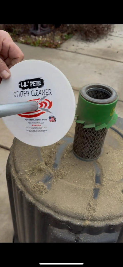 Air Filter Cleaner Kit For 1.5 To 4 Inch ID Filters With Rotating Nozzle System shown in use on dusty filter