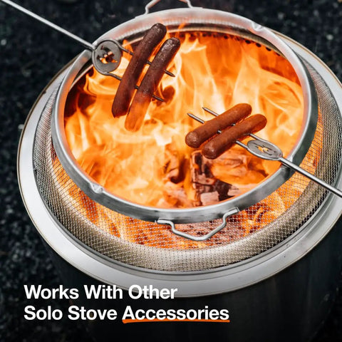 Bonfire Shield Spark Protector Mesh Screen For Fire Pits Durable Stainless Steel Guard with sausages cooking over flames