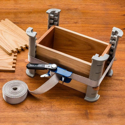 Workhorse Durable 1 Inch By 15 Inch Quick Grip Band Clamp with attached handle securing a wooden box project.
