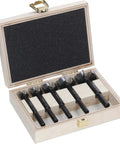 Five Piece Forstner Drill Bit Set With Rugged Three Flat Shank Grip Killer Longevity For Hardwood And Softwood Tasks Smooth Blind Hole Drilling in a wooden storage case.