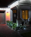 House decorated with 100 Pack Pure White C9 LED Christmas Light Bulbs, Dimmable And Shatterproof, E17 Base, bright illumination