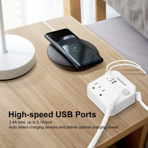 15 Ft Long Extension Cord With 3 Outlet Desk Power Strip And 3 USB Ports on wooden desk with charging phone and lamp.