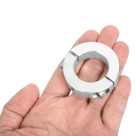 Rock Solid Two Piece Double Split Shaft Collars With Tight Set Screws 1.125 Inch Bore And 1.875 Inch Outer Diameter held in hand.
