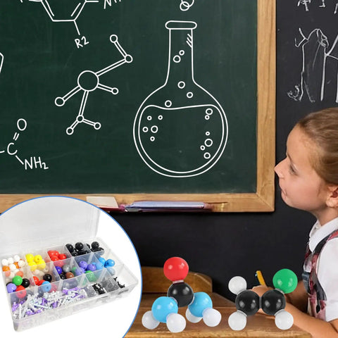 Child learning with Hands On Organic Chemistry Model Kit For Learning And Exploration, 444 Piece Molecular Kit displayed on table.