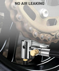 20 Inch Tire Inflator Hose Adapter With Self Locking Air Chuck Schrader And Presta Valve Compatibility installing on bike tire
