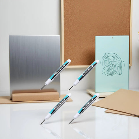 Heavy Hitter White Oil Based Permanent Markers Pro Grade Industrial Pens For Metal Glass And Hard Surfaces Fast Dry Paint Marker Set With Fine Tips For Workshop Jobs And Weekend Builds on a reflective surface with metal and cork boards.