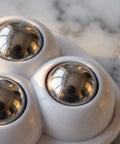 Close-up of 3pcs 12pcs Furniture Caster Wheels, 360 Degree Swivel Self Adhesive, stainless steel on a white base.