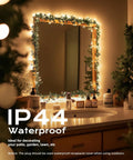 Bathroom mirror decorated with Clear Incandescent Mini Christmas Lights 100-Count On 20 Ft White Wire End-To-End Connectable
