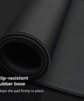 Close-up of black Giant XXL Waterproof Gaming Mouse Pad With Stitched Edge Non Slip Desk Mat For Gamers