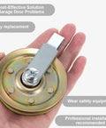 Heavy Duty Garage Door Pulley Kit With 3 Inch Pulleys And 3 Eighths Inch Track Kit Includes 8 Golden Pulleys 8 Silver Clevis Forks And 8 Bolts And Nuts Set All In One For Quick Easy Durable Garage Door Repairs. Shown is a single pulley on a hand for scale.