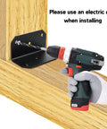 Installation of Heavy Duty Steel L Brackets using a power drill on wooden support for woodworking projects.