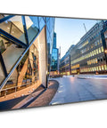 86 Inch 4K UHD Screen With Straight Fire HDR Clarity Built For Bold Digital Signage Displays And Modern Workspaces showing cityscape.