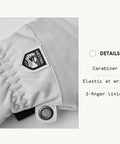 Close-up of Army Leather Heli Ski 3 Finger Women's Leather Snow Glove in misty grey with HESTRA logo and carabiner detail.