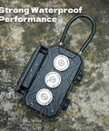 Key Lock Box With Removable Cable Shackle For Indoor Or Outdoor Use, Waterproof 4 Digit Resettable Combo, close-up view on wet ground