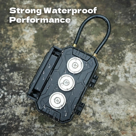 Key Lock Box With Removable Cable Shackle For Indoor Or Outdoor Use, Waterproof 4 Digit Resettable Combo, close-up view on wet ground