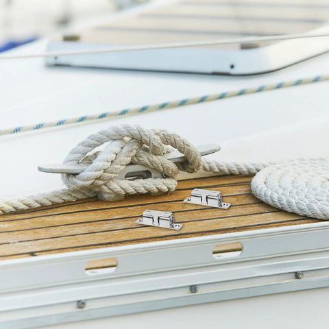 Stainless Steel Boat Door Latches Four Pack For RVs And Closets Marine Cabinet Hardware on boat deck with rope.