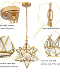 Detailed view of Moravian Star Brass Pendant Light, showing 2-tier brass finish canopy, clear glass shade, and height adjustable chain 47".