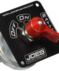 Joes Racing 4-terminal battery disconnect switch on black panel with red lever; JOES logo visible