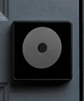 Heavy Duty Stainless Steel Decorative Deadbolt Cover Plate For Entry Doors With Slick Black Round Filler covering extra keyhole gap.