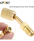 Close-up of brass 45° angled Two Pack 5/16 To 1/4 SAE Quick Couplers for R410A ductless mini split systems HVAC service.