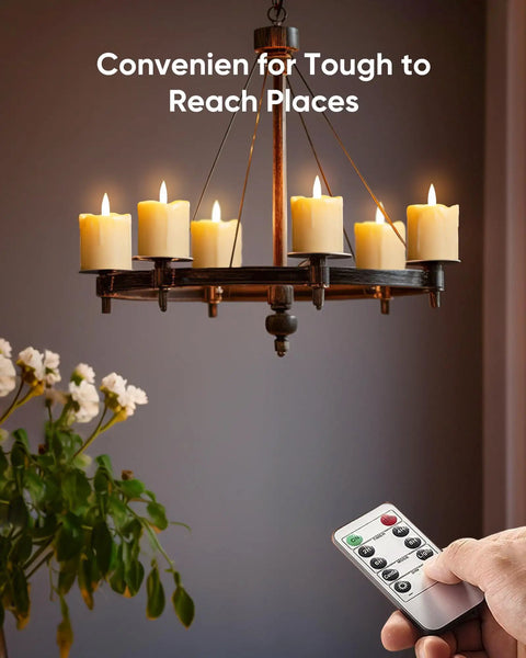 Hand holding remote with chandelier featuring Six Pack Remote Timer Flameless Candles 2x2 LED Votive Lights Battery Operated