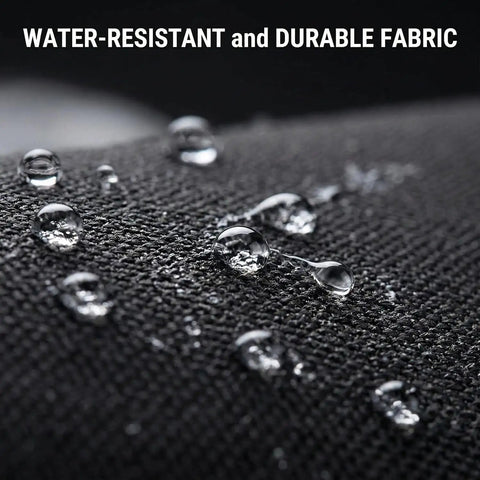 Close-up of droplets on black fabric showing water-resistant feature of Waterproof Travel Cable Organizer Pouch With Double Layer Storage.